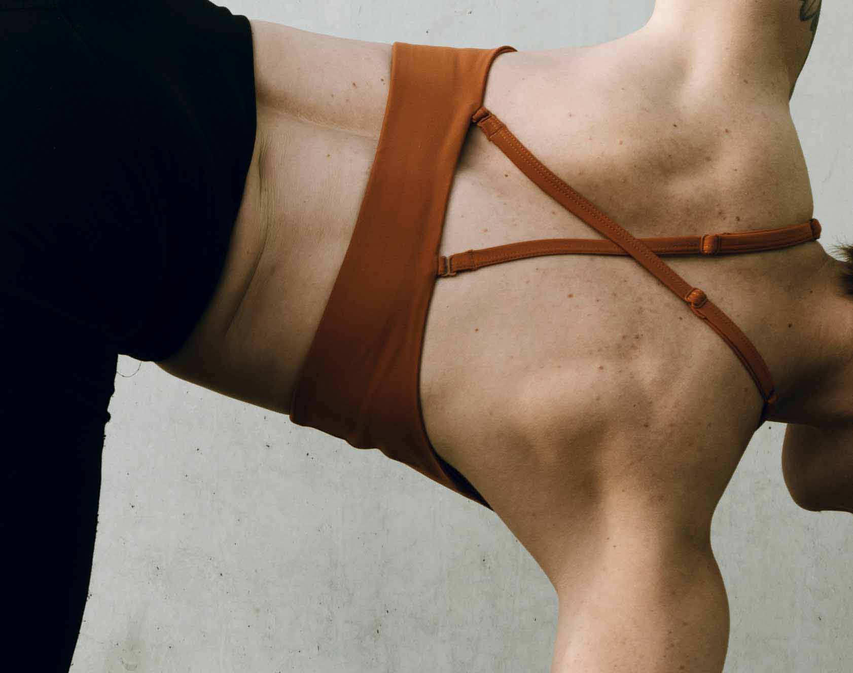 zenith-academy Woman doing a yoga pose.